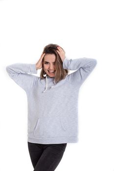 Creative girl showing tongue out isolated on white background