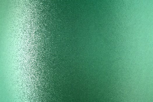 Glowing green metallic wall, abstract texture background
