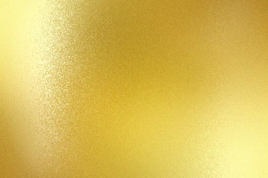 Shiny brushed gold metallic panel, abstract texture background