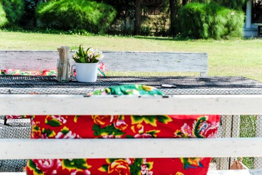 Image of Empty table in the house's garden