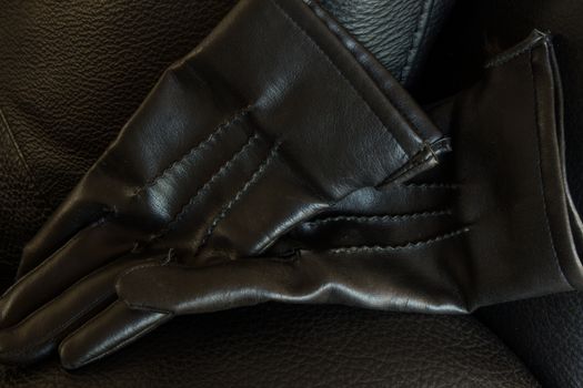 Black leather gloves, landscape orientation, copy space.