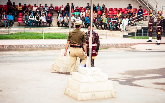 Petrapole-Benapole, Bangaon, 5th Jan, 2019: Joint Retreat of lowering of national flags Ceremony, a military show as Wagah Border with soldiers of Border Guard Security Force of India and Bangladesh.