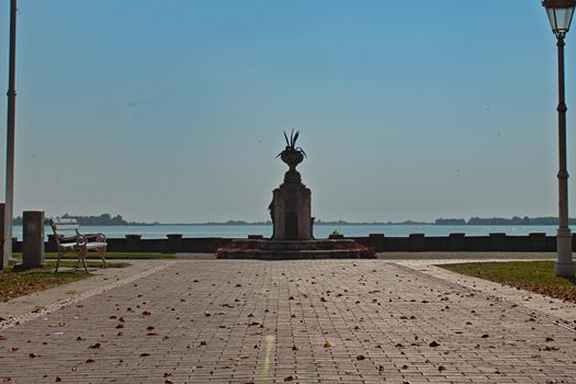 View on monument at boardwalk of Palic Lake, Serbia