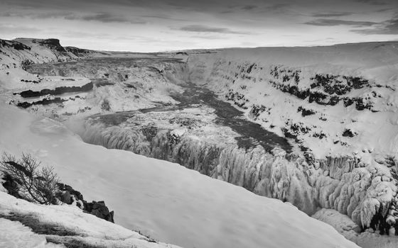 Panoramic image of the frozen waterfall Gullfoss, Iceland, Europe
