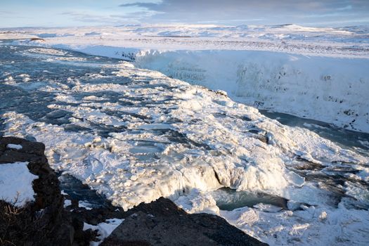 Panoramic image of the frozen waterfall Gullfoss, Iceland, Europe
