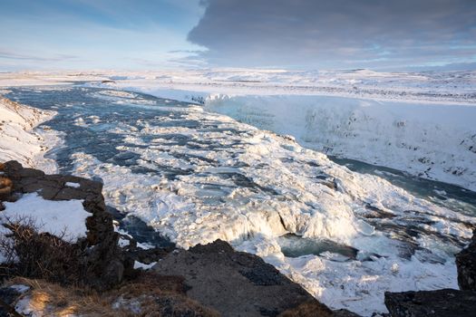 Panoramic image of the frozen waterfall Gullfoss, Iceland, Europe