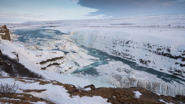 Panoramic image of the frozen waterfall Gullfoss, Iceland, Europe