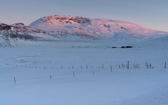 Sunrise over snow-covered mountains, Iceland, Europe