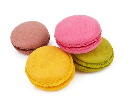 french colorful macarons isolated on white background