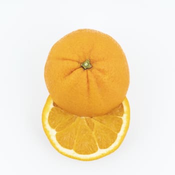 an orange cut on a white surface