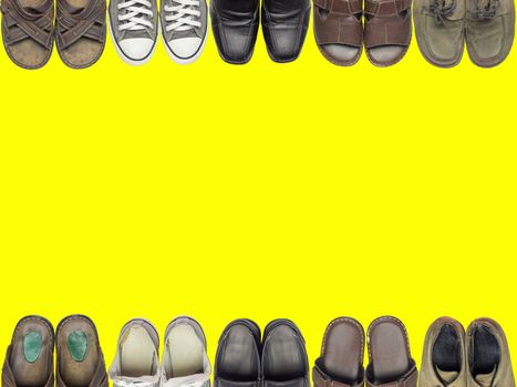 Many of shoes and sandal on isolate yellow background. Suitable for a background or accompanying an article about shoes.