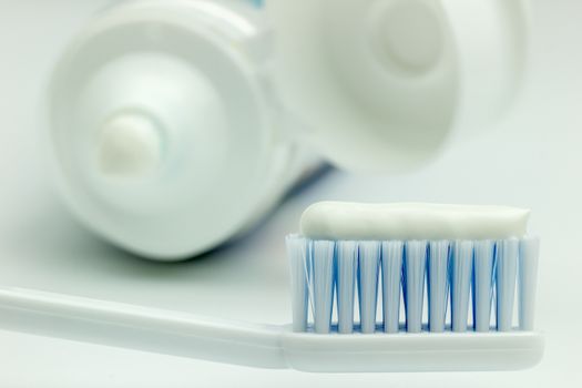 Close up Toothbrush and toothpaste tube on a white background. Suitable for dental health articles or Use a campaign for children to brush their teeth.