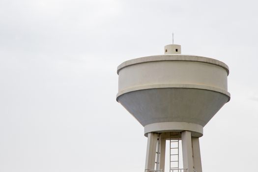 Water tank cement with white sky