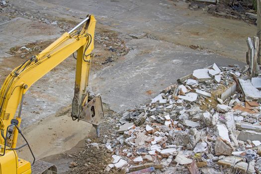 Demolition of an industrial building and drill concrete machine 