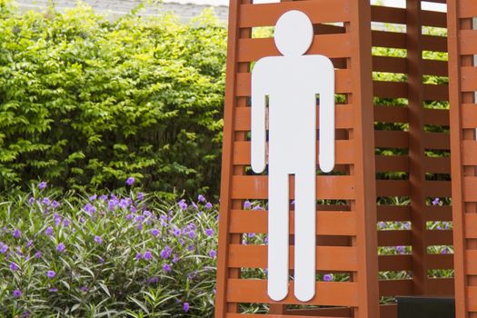 White man's toilet symbol, striped background