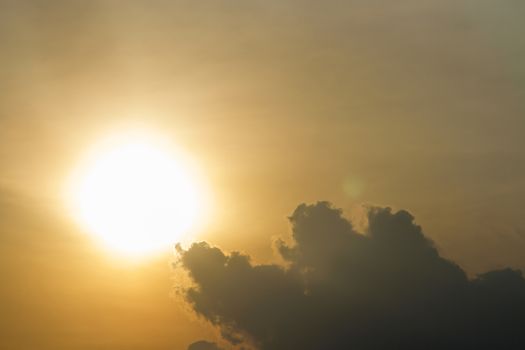 Evening sun with clouds on the sun