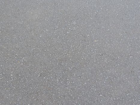 The texture of a gray asphalt floor background
