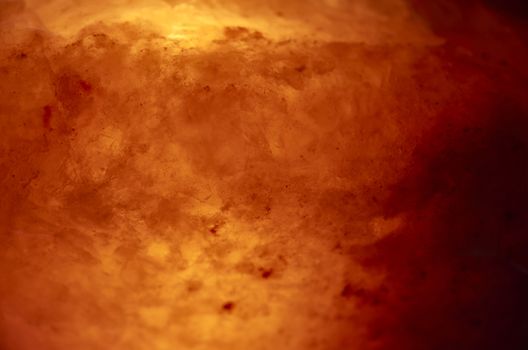 macro photography of salt lamp imitating incandescent lava