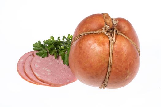 Ham and greenery on an isolated studio background