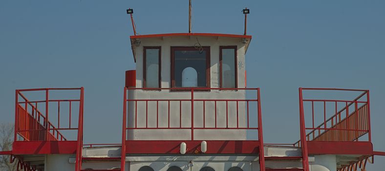 Front view on a top white and red boat