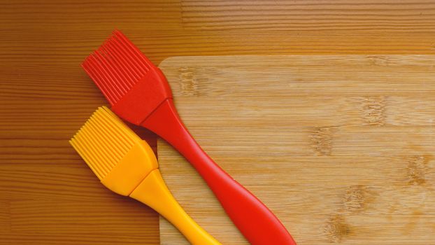 Empty cutting board on planks food background concept. Kitchen and cooking concept on wooden background. Space for text