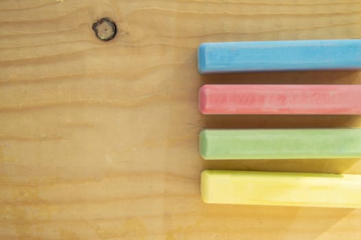 Flat lay, chalk on wooden Board background, back to school, copy space.