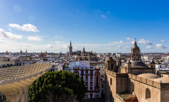 Seville, Spain - July 15, 2017: Seville is the capital of the autonomous community of Andalusia in southern Spain. Streets and sights of the city architecture.