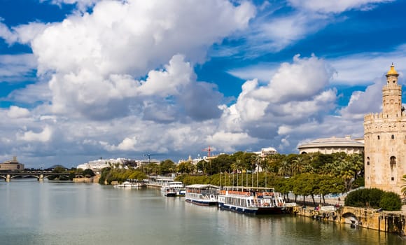 Seville, Spain - July 15, 2017: Seville is the capital of the autonomous community of Andalusia in southern Spain. Streets and sights of the city architecture.