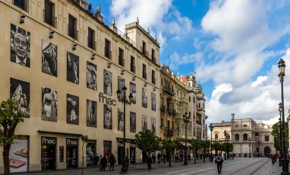 Seville, Spain - July 15, 2017: Seville is the capital of the autonomous community of Andalusia in southern Spain. Streets and sights of the city architecture.