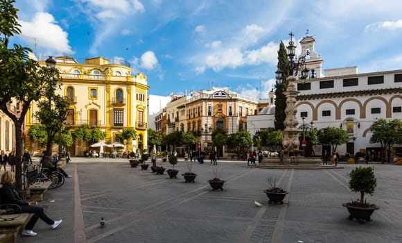 Seville, Spain - July 15, 2017: Seville is the capital of the autonomous community of Andalusia in southern Spain. Streets and sights of the city architecture.