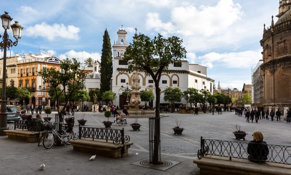 Seville, Spain - July 15, 2017: Seville is the capital of the autonomous community of Andalusia in southern Spain. Streets and sights of the city architecture.