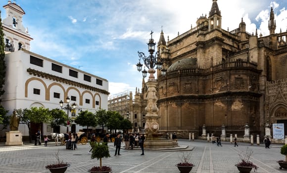 Seville, Spain - July 15, 2017: Seville is the capital of the autonomous community of Andalusia in southern Spain. Streets and sights of the city architecture.