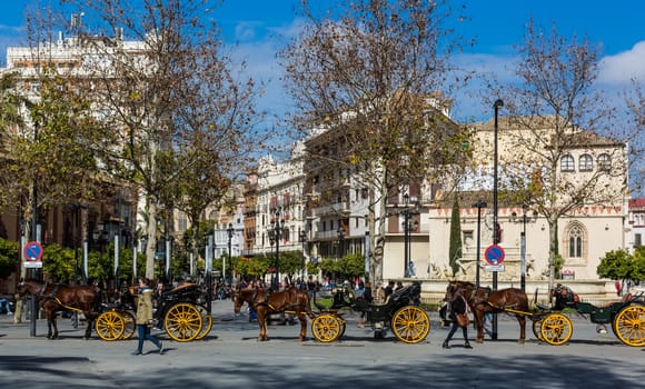 Seville, Spain - July 15, 2017: Seville is the capital of the autonomous community of Andalusia in southern Spain. Streets and sights of the city architecture.