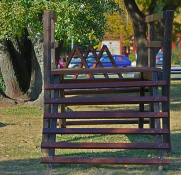 wooden children climbing toy in public park