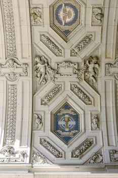 A close-up photo of architectural details on the ceiling in the arch of the Berliner Dom, also known as the Berlin Cathedral