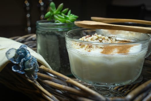 Homemade dessert decorated with handmade napkins in a wicker tray.