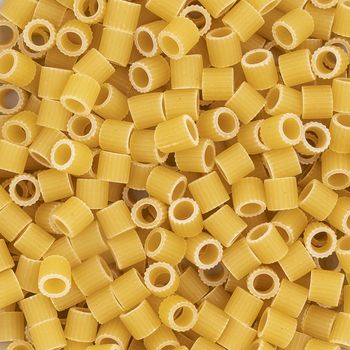 some small pieces of dried pasta as a background