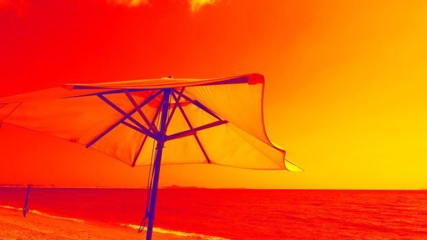 White fabric color texture beach umbrella and brown wood tripod with white cloud and clear blue sky summer sunlight day in low angle view camera for travel asia Thailand Pattaya.