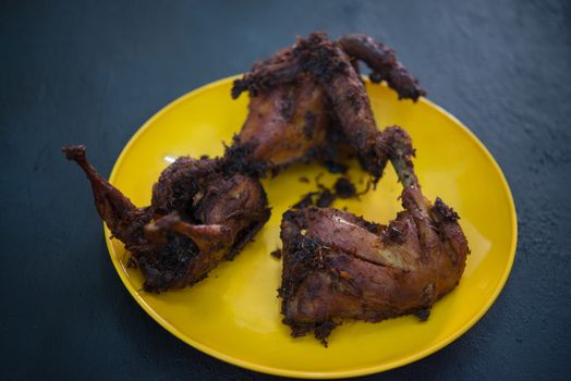 Traditional Malay style fried chicken with spices.