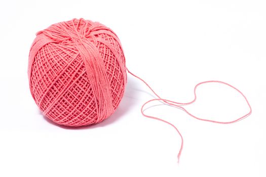 pink ball of yarn for knitting, isolate, homemade handicrafts, wool