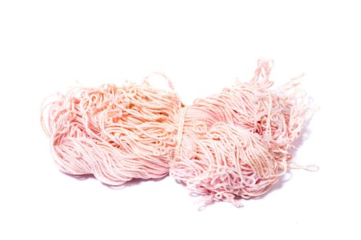 pink yarn for knitting, isolate, homemade handicrafts