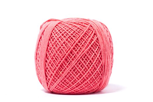 pink ball of yarn for knitting, isolate, homemade handicrafts, wool