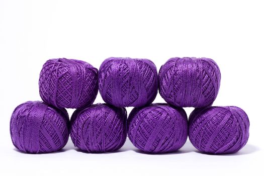 a ball of yellow knitting yarn, isolate, homemade handicrafts, woolen yarn