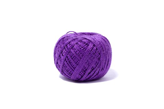 a ball of purple knitting yarn, isolate, homemade handicrafts, woolen yarn