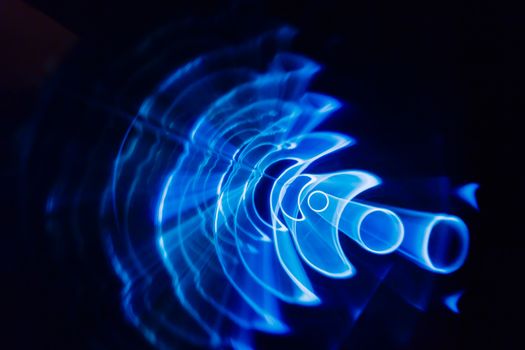 Sound waves in the visible blue color in the dark