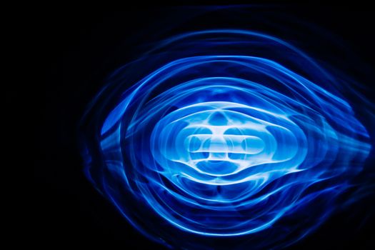 Sound waves in the visible blue color in the dark