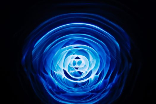 Sound waves in the visible blue color in the dark