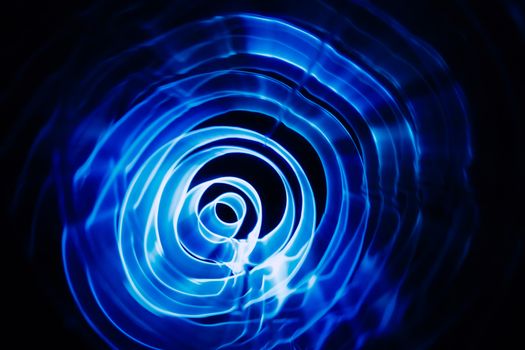 Sound waves in the visible blue color in the dark