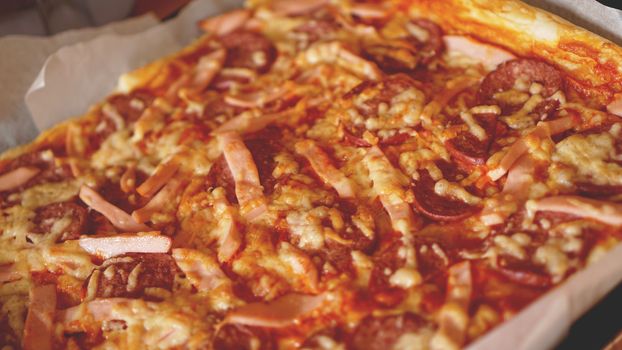 Simple Homemade Pizza on a rustic wooden table.