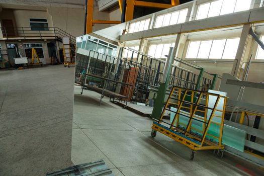 The interior of a large glass and mirror cutting factory